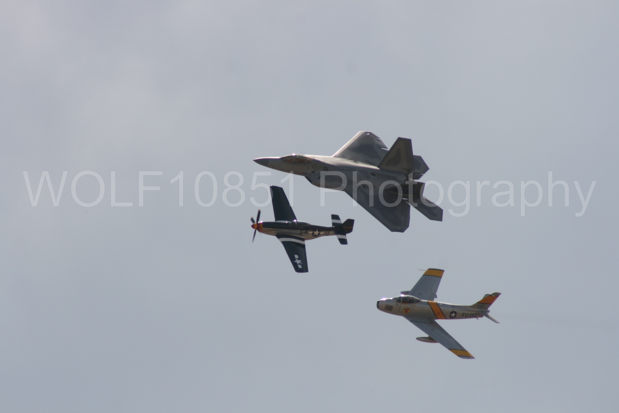 Aviation photography by WOLF10851 featuring Heritage Flight, P-51 Mustang, California Capital Airshow 2009, F-22 Raptor, Wee Willy 2.