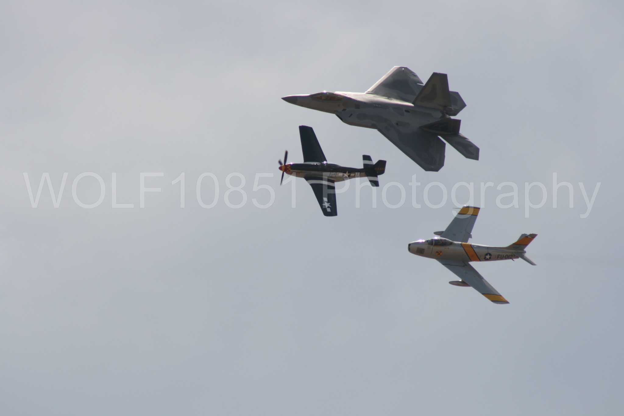 Aviation photography by WOLF10851 featuring Heritage Flight, P-51 Mustang, California Capital Airshow 2009, F-22 Raptor, Wee Willy 2.