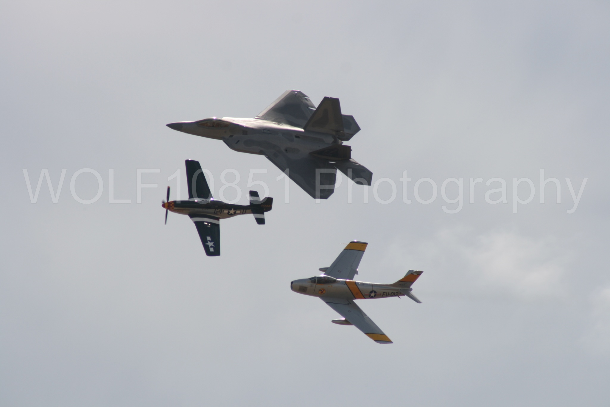 Aviation photography by WOLF10851 featuring Heritage Flight, P-51 Mustang, California Capital Airshow 2009, F-22 Raptor, Wee Willy 2.
