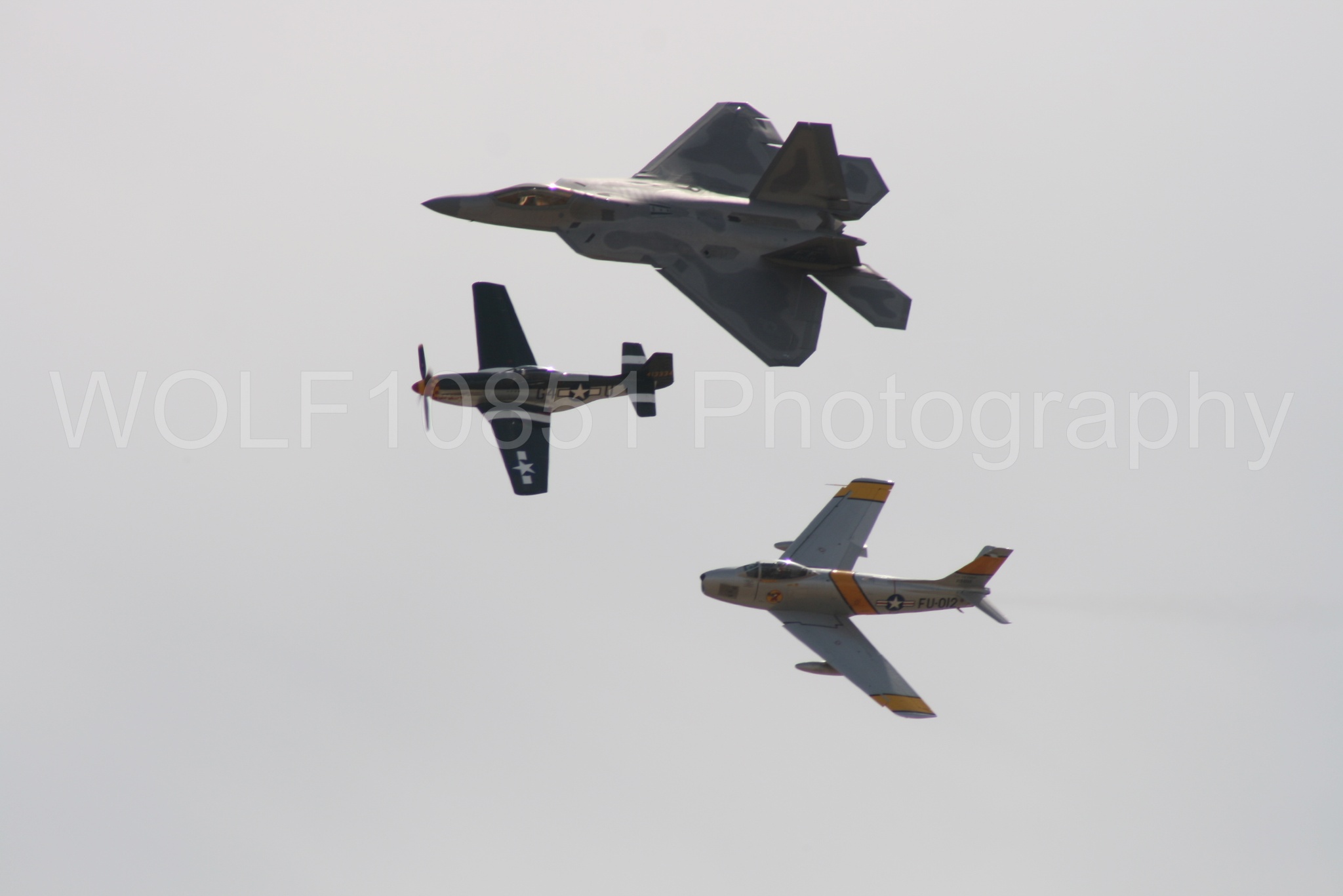 Aviation photography by WOLF10851 featuring Heritage Flight, P-51 Mustang, California Capital Airshow 2009, F-22 Raptor, Wee Willy 2.