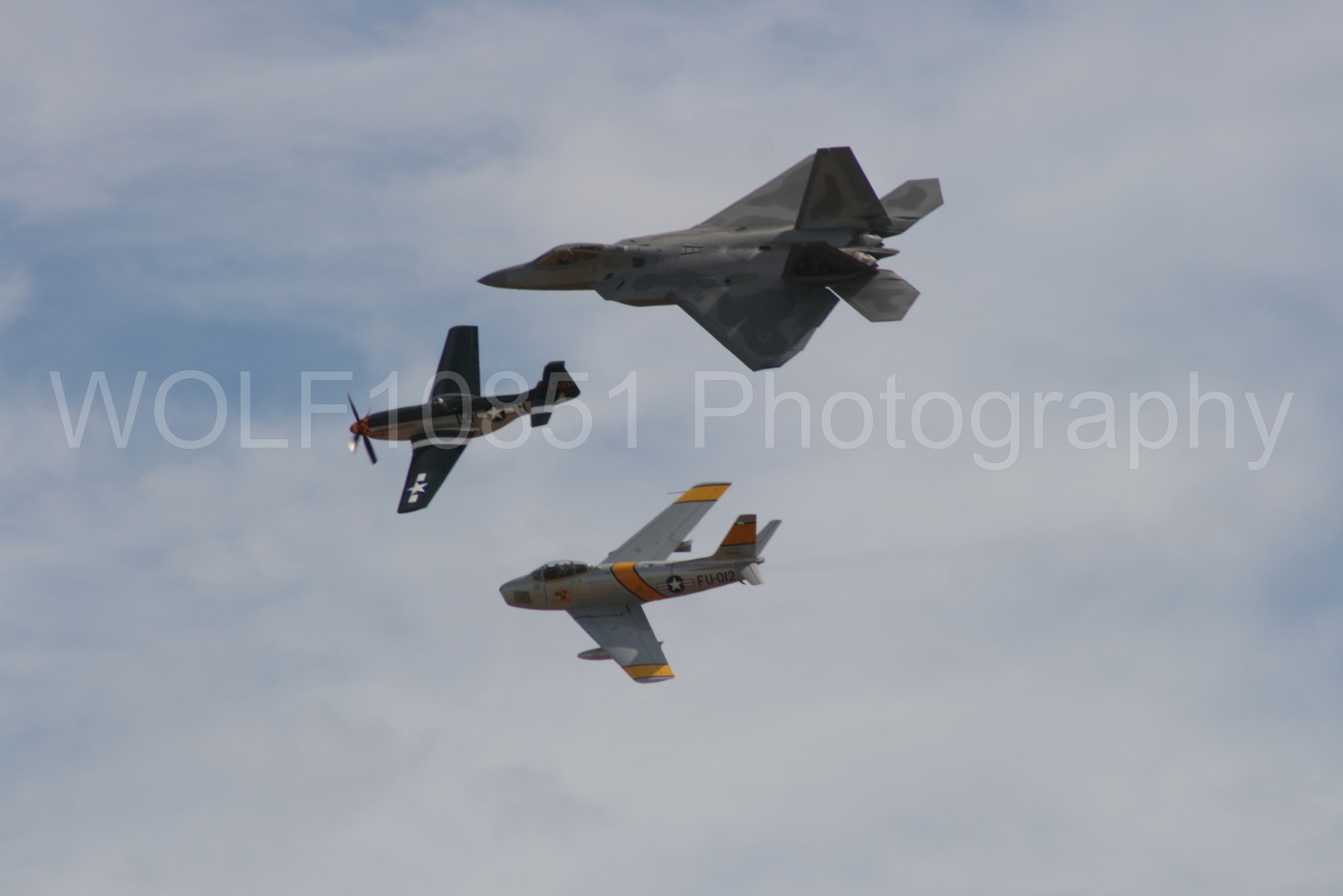 Aviation photography by WOLF10851 featuring Heritage Flight, P-51 Mustang, California Capital Airshow 2009, F-22 Raptor, Wee Willy 2.
