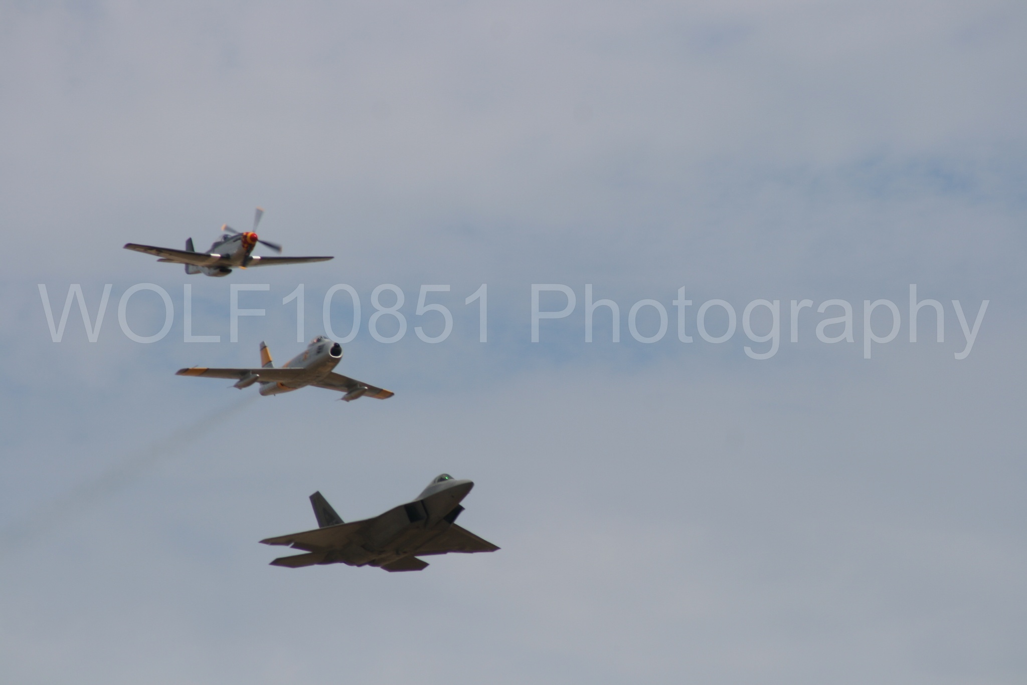 Aviation photography by WOLF10851 featuring Heritage Flight, P-51 Mustang, California Capital Airshow 2009, F-22 Raptor, Wee Willy 2.