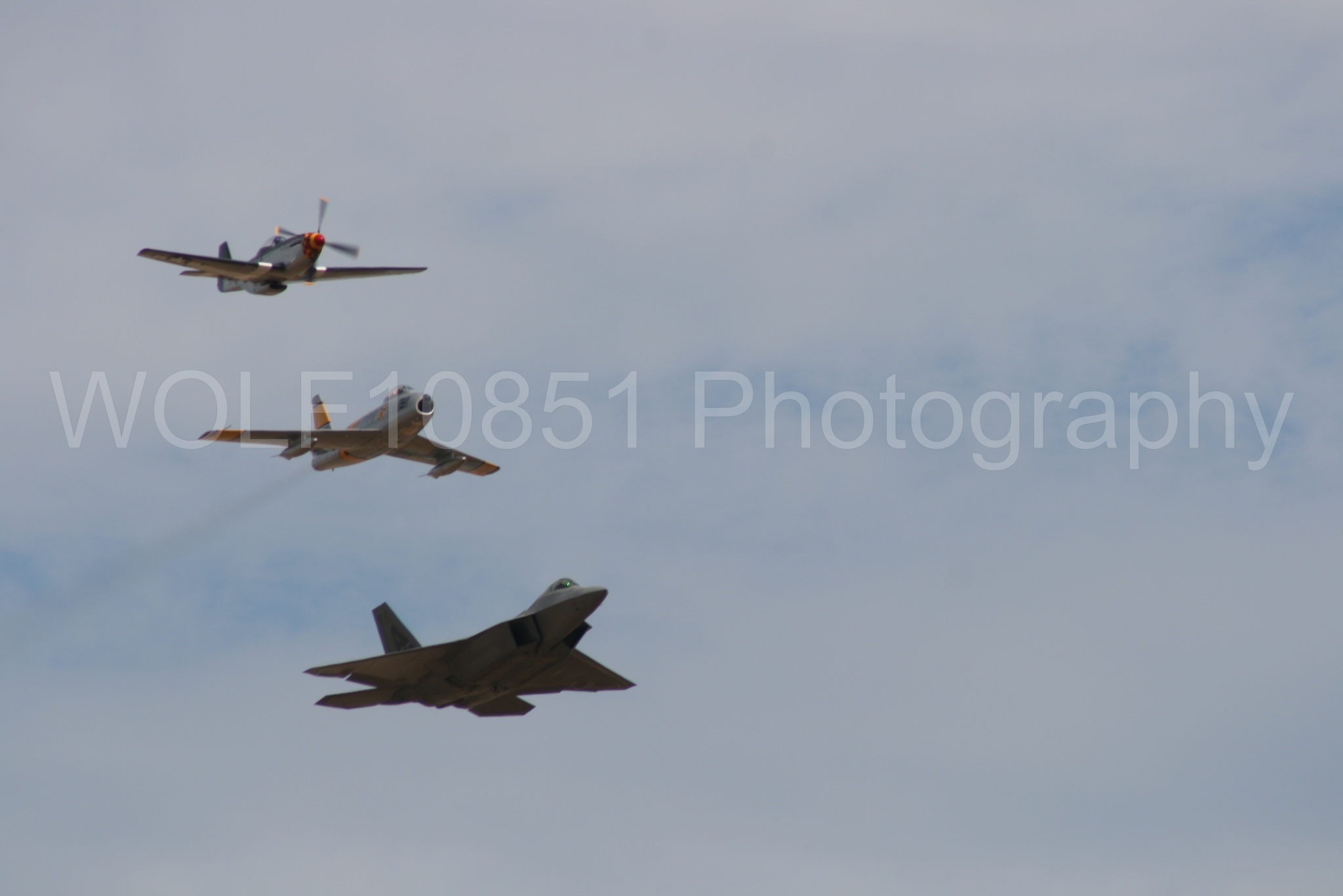 Aviation photography by WOLF10851 featuring Heritage Flight, P-51 Mustang, California Capital Airshow 2009, F-22 Raptor, Wee Willy 2.