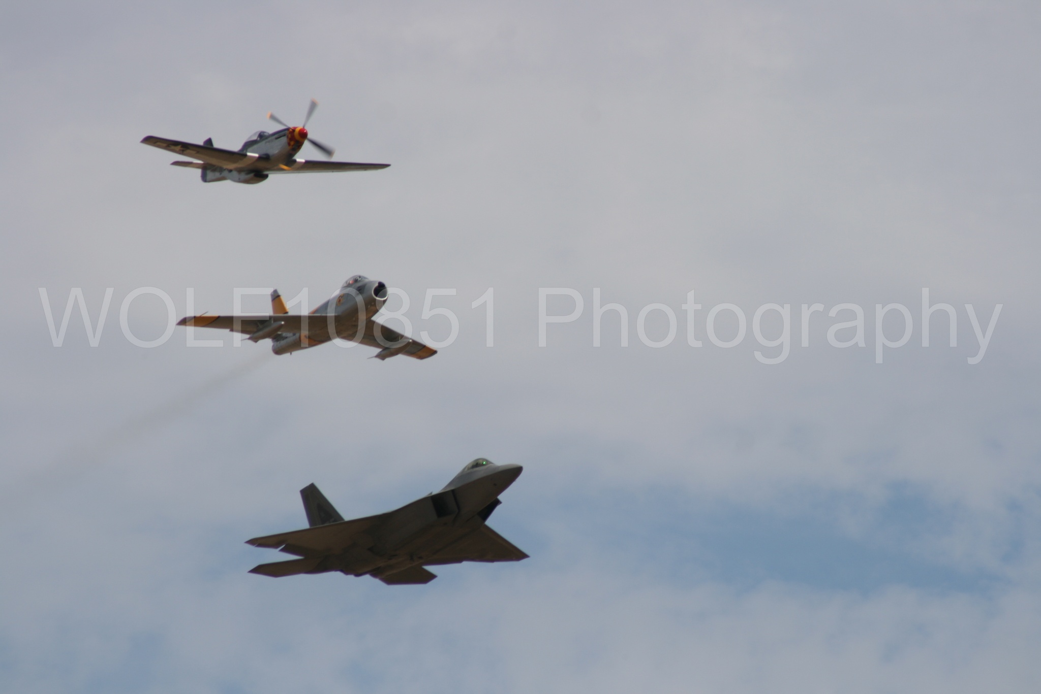 Aviation photography by WOLF10851 featuring Heritage Flight, P-51 Mustang, California Capital Airshow 2009, F-22 Raptor, Wee Willy 2.