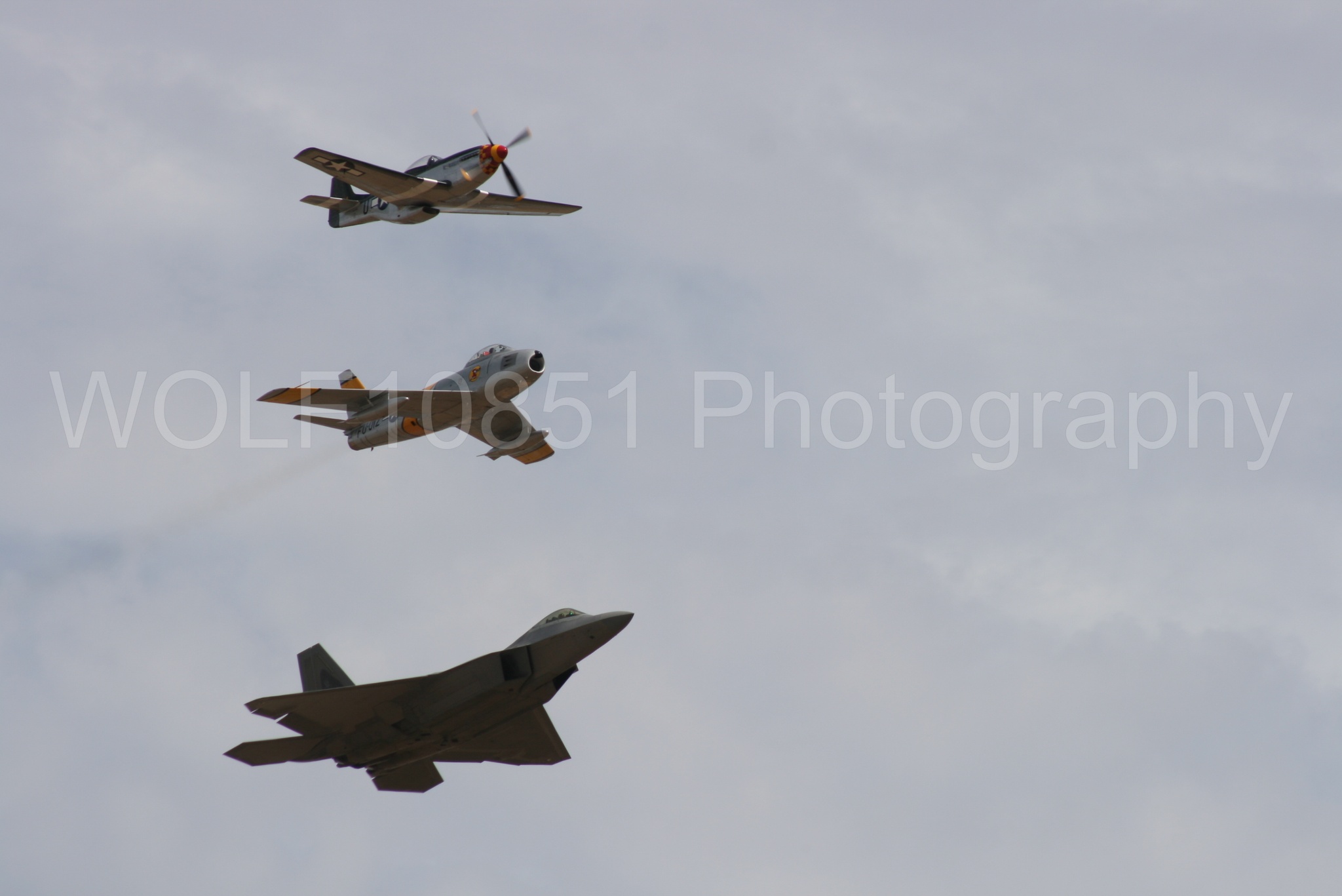 Aviation photography by WOLF10851 featuring Heritage Flight, P-51 Mustang, California Capital Airshow 2009, F-22 Raptor, Wee Willy 2.