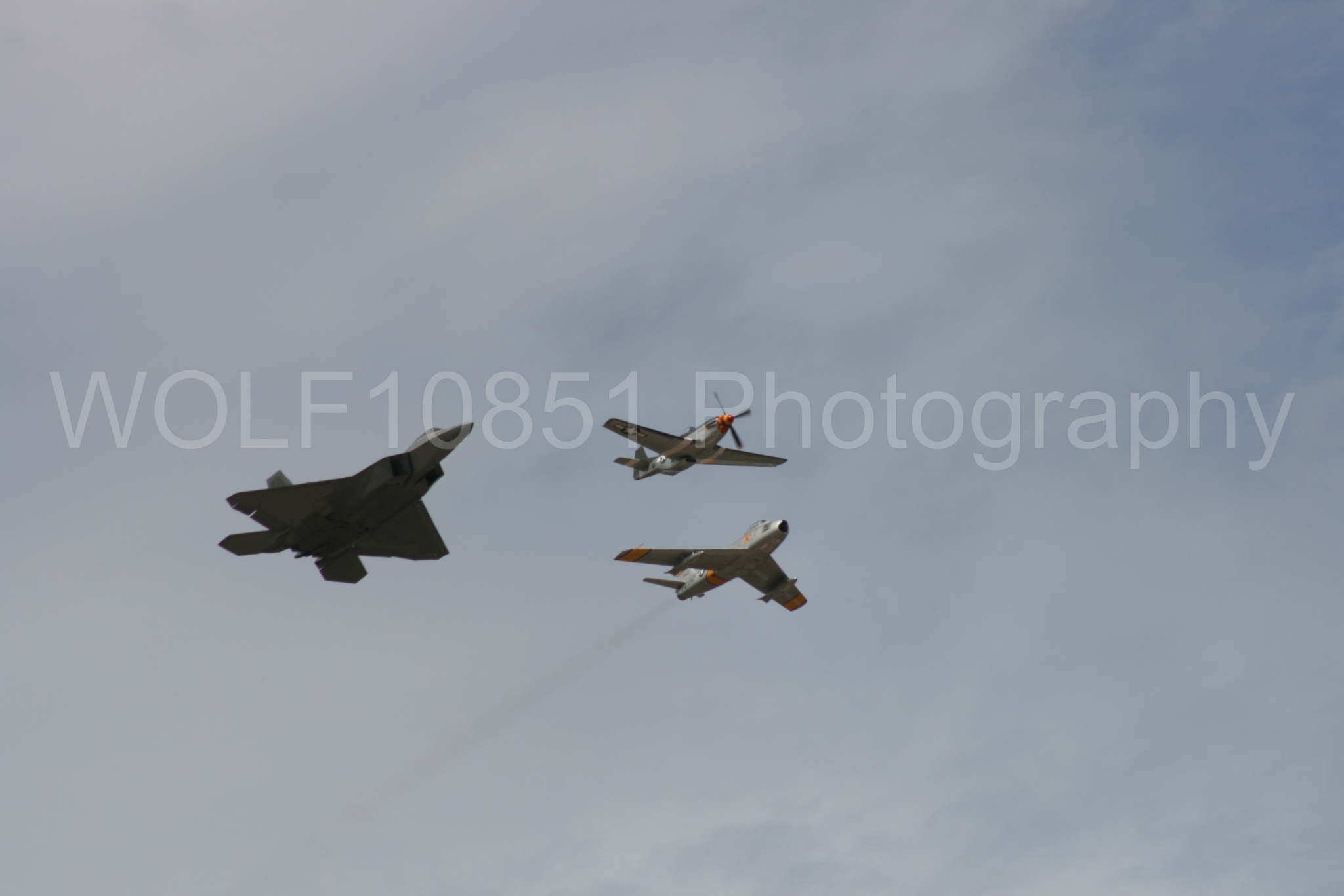 Aviation photography by WOLF10851 featuring Heritage Flight, P-51 Mustang, California Capital Airshow 2009, F-22 Raptor, Wee Willy 2.