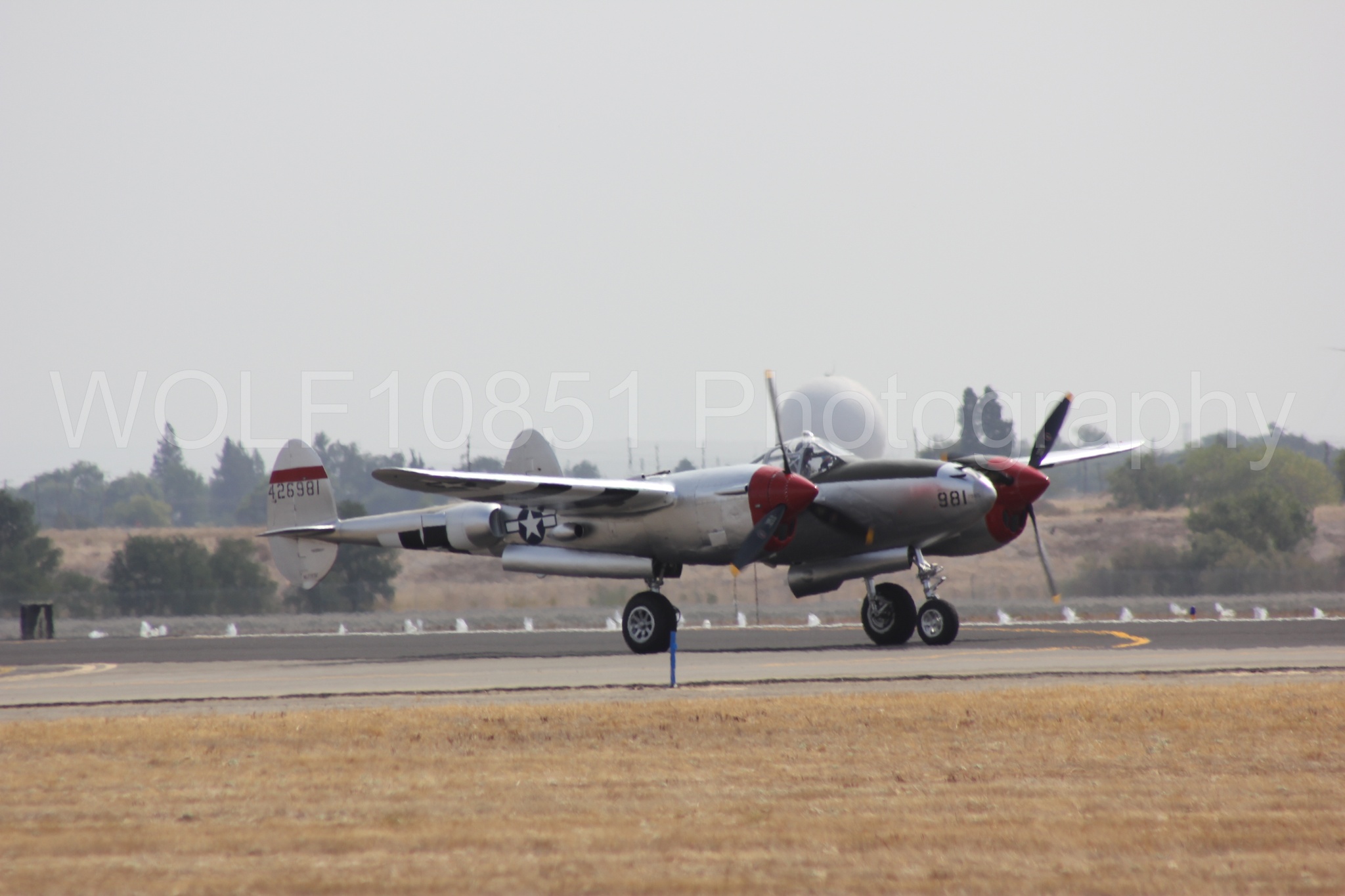 Aviation photography by WOLF10851 featuring P-38 Lightning, Honey Bunny, California Capital Airshow 2011.