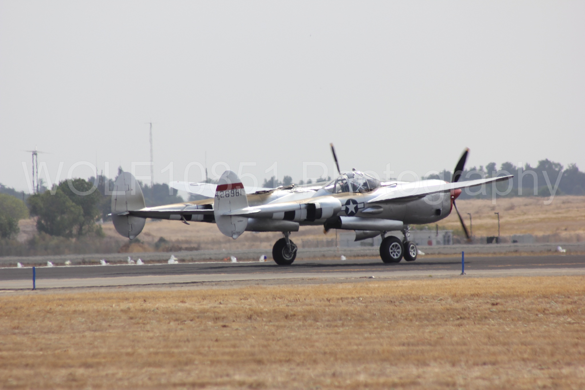 Aviation photography by WOLF10851 featuring P-38 Lightning, Honey Bunny, California Capital Airshow 2011.