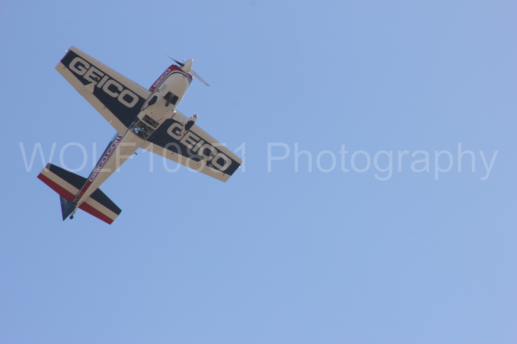 Aviation photography by WOLF10851 featuring Tim Weber, Extra EA-300, California Capital Airshow 2012.