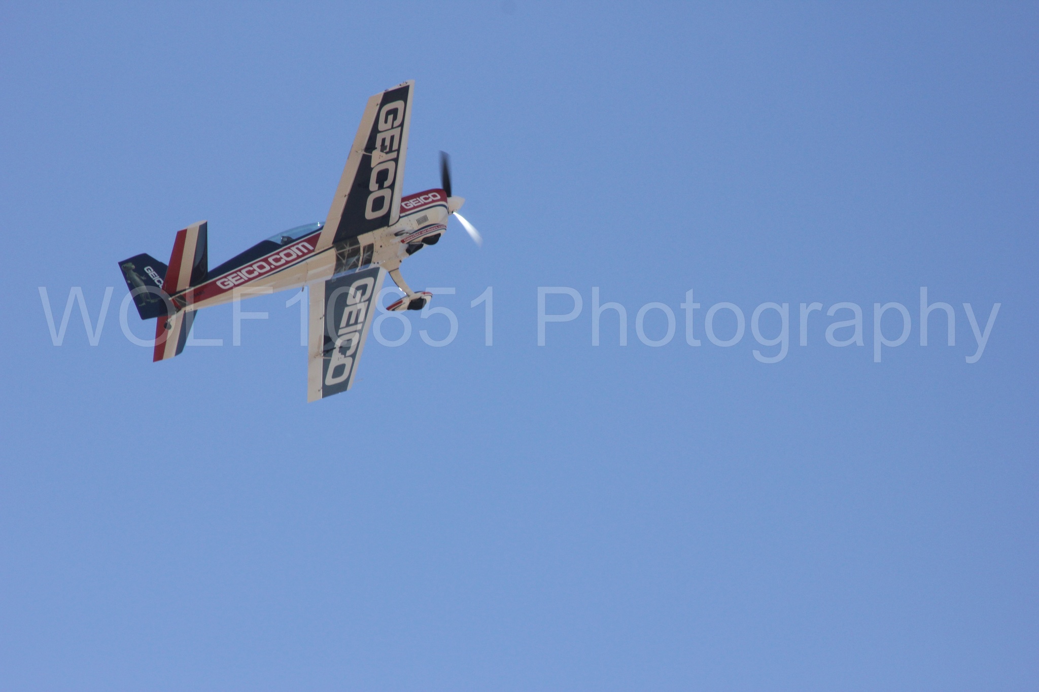 Aviation photography by WOLF10851 featuring Tim Weber, Extra EA-300, California Capital Airshow 2012.