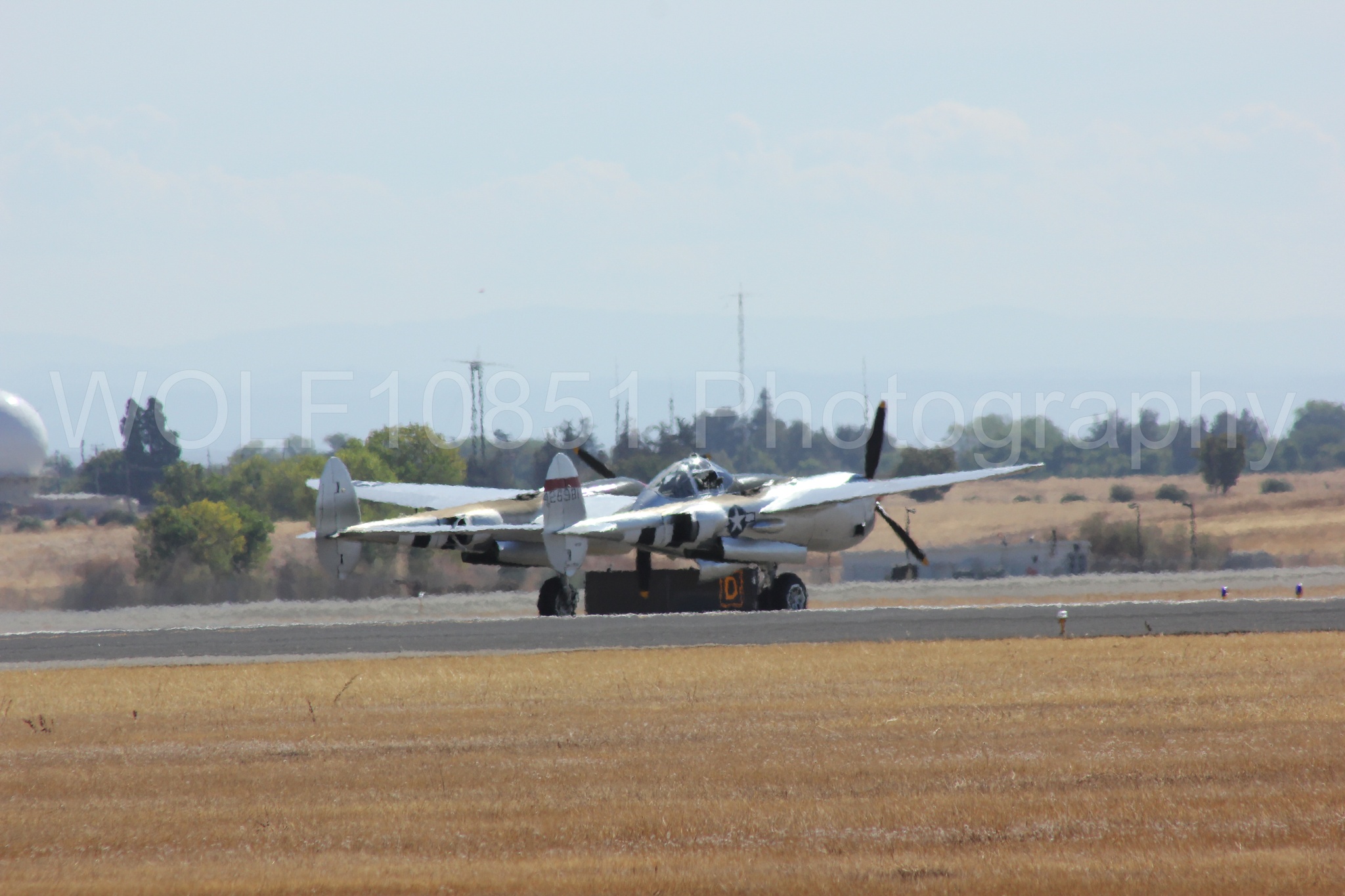Aviation photography by WOLF10851 featuring P-38 Lightning, Honey Bunny, California Capital Airshow 2012.