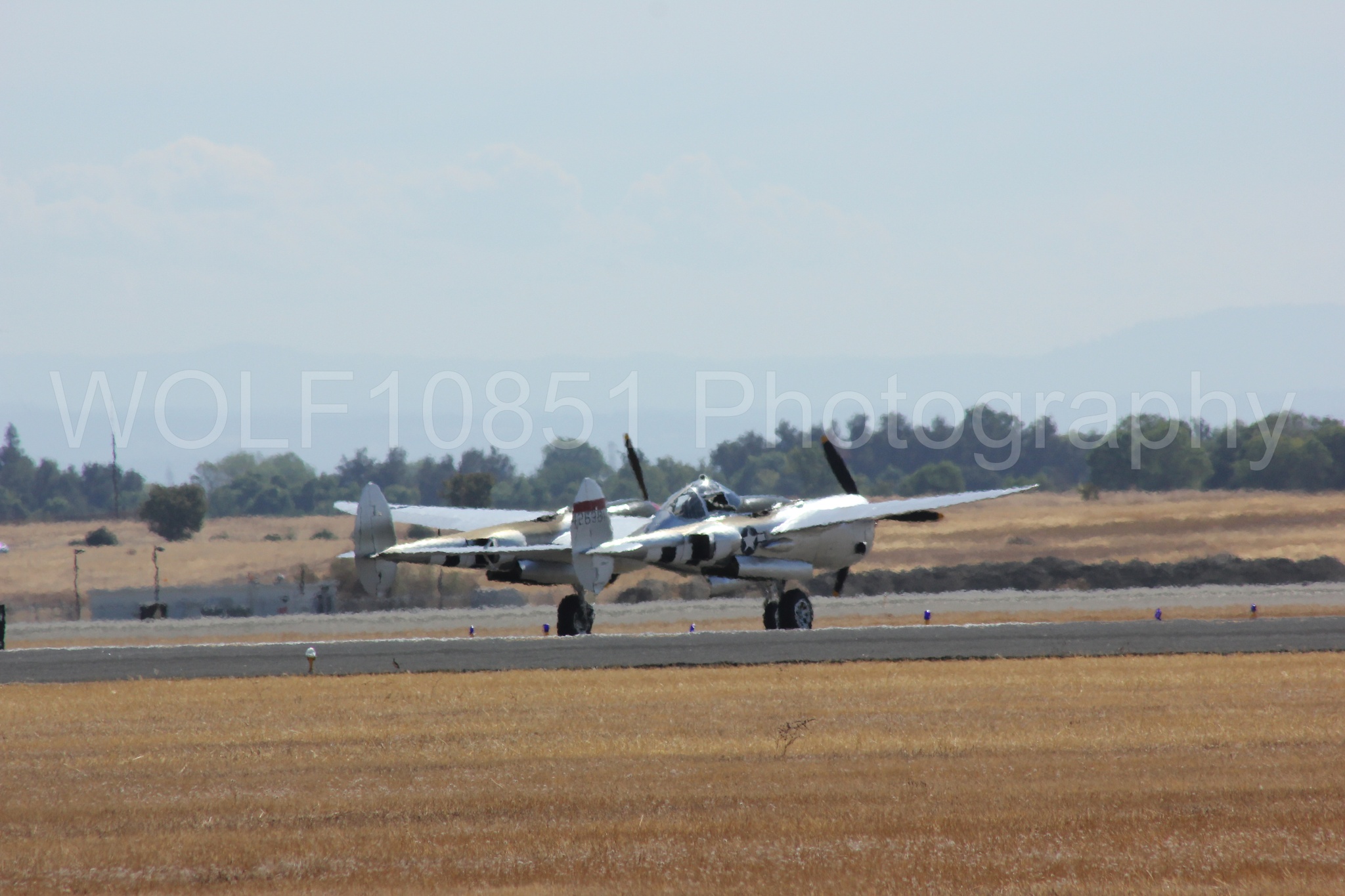 Aviation photography by WOLF10851 featuring P-38 Lightning, Honey Bunny, California Capital Airshow 2012.