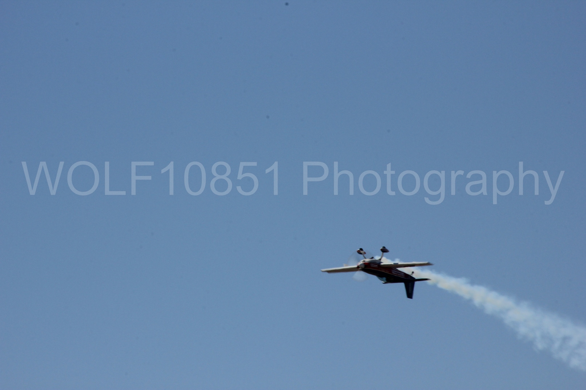 Aviation photography by WOLF10851 featuring Tim Weber, Geico, GEICO Skytypers, Extra EA-300, California Capital Airshow 2012.
