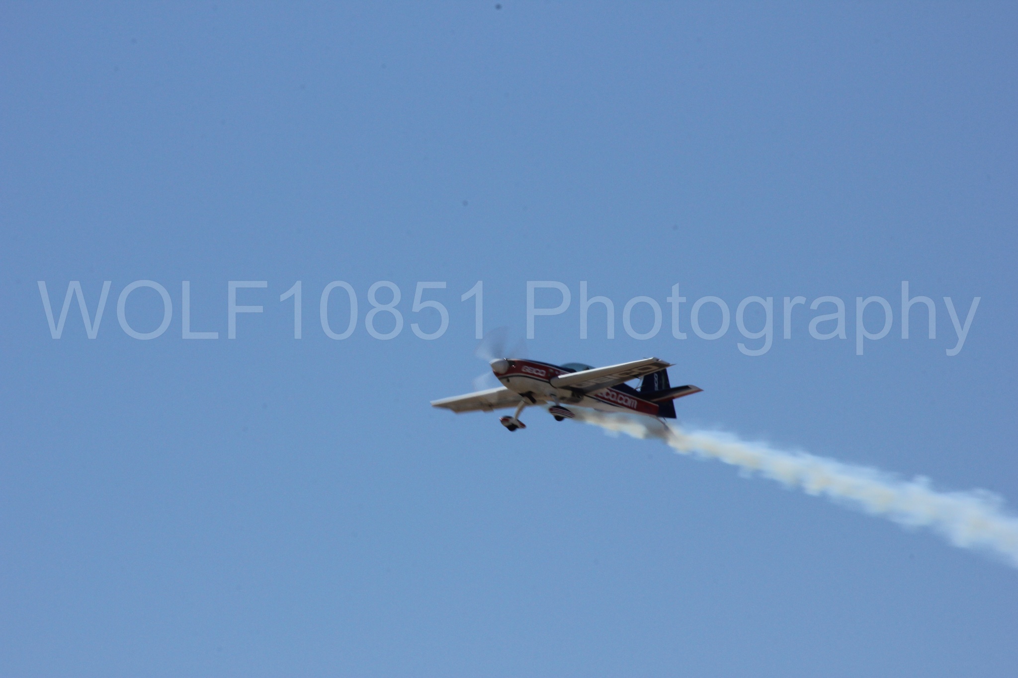 Aviation photography by WOLF10851 featuring Tim Weber, Geico, GEICO Skytypers, Extra EA-300, California Capital Airshow 2012.