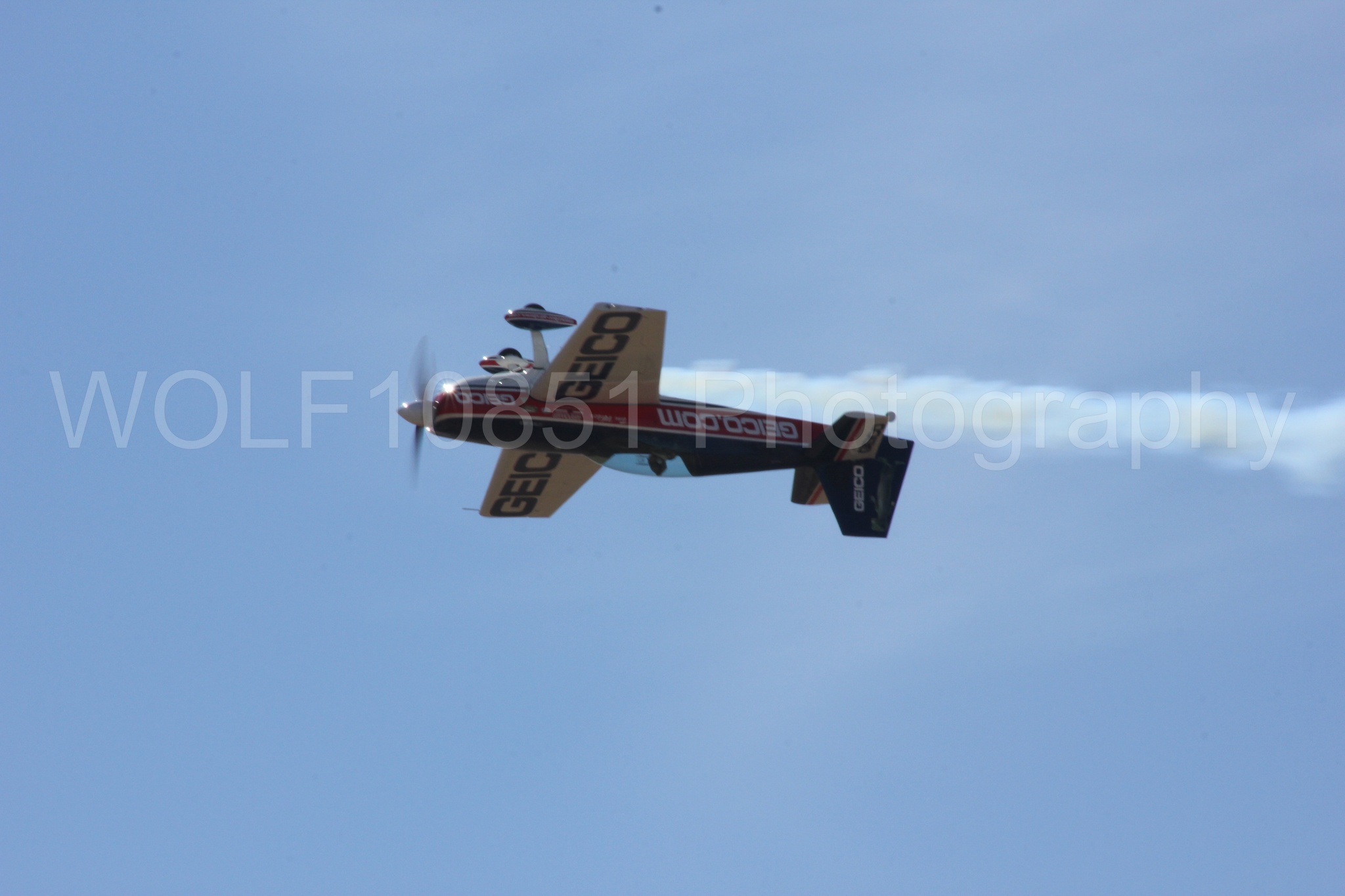 Aviation photography by WOLF10851 featuring Tim Weber, Geico, GEICO Skytypers, Extra EA-300, California Capital Airshow 2012.