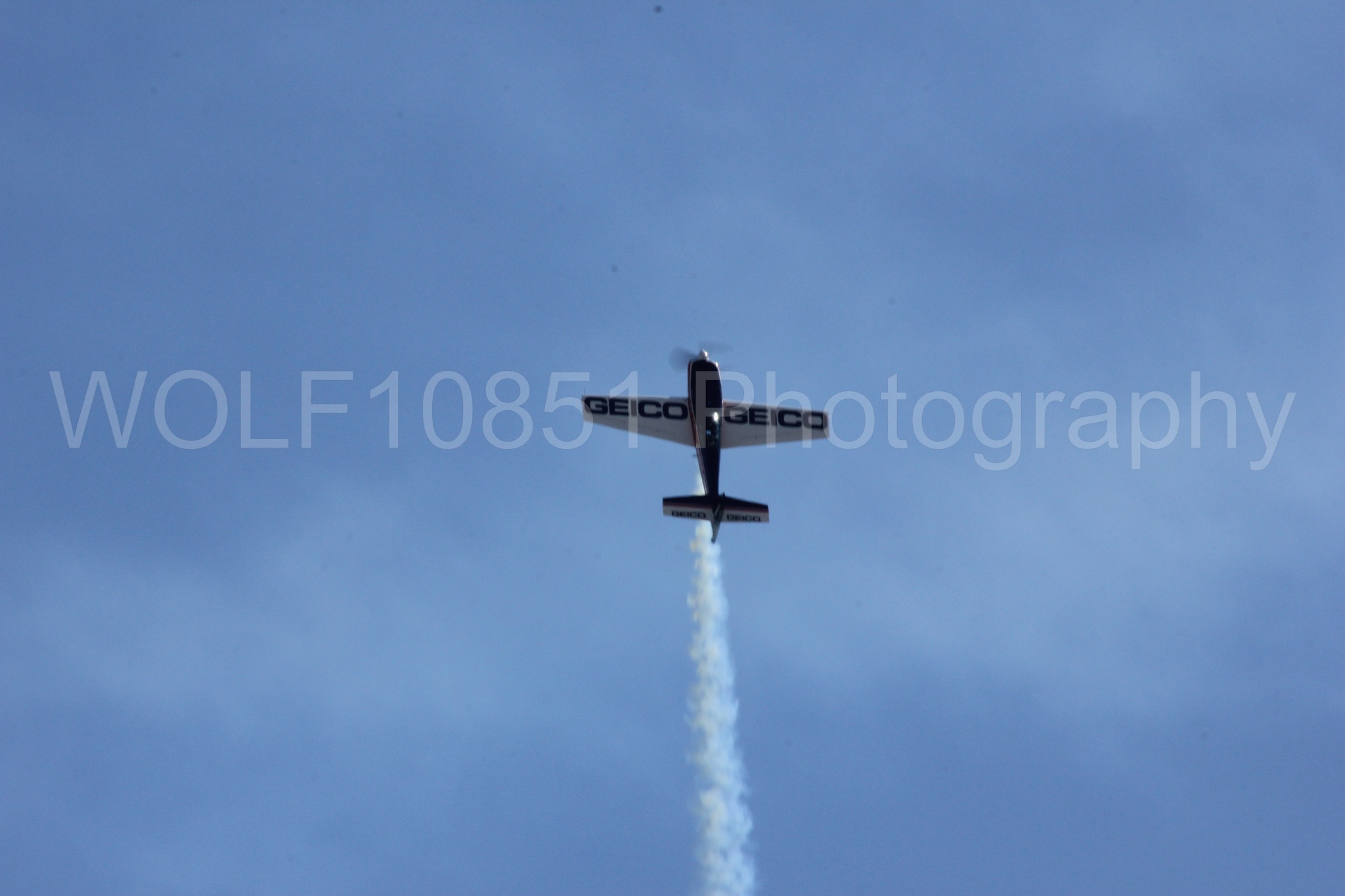 Aviation photography by WOLF10851 featuring Tim Weber, Geico, GEICO Skytypers, Extra EA-300, California Capital Airshow 2012.