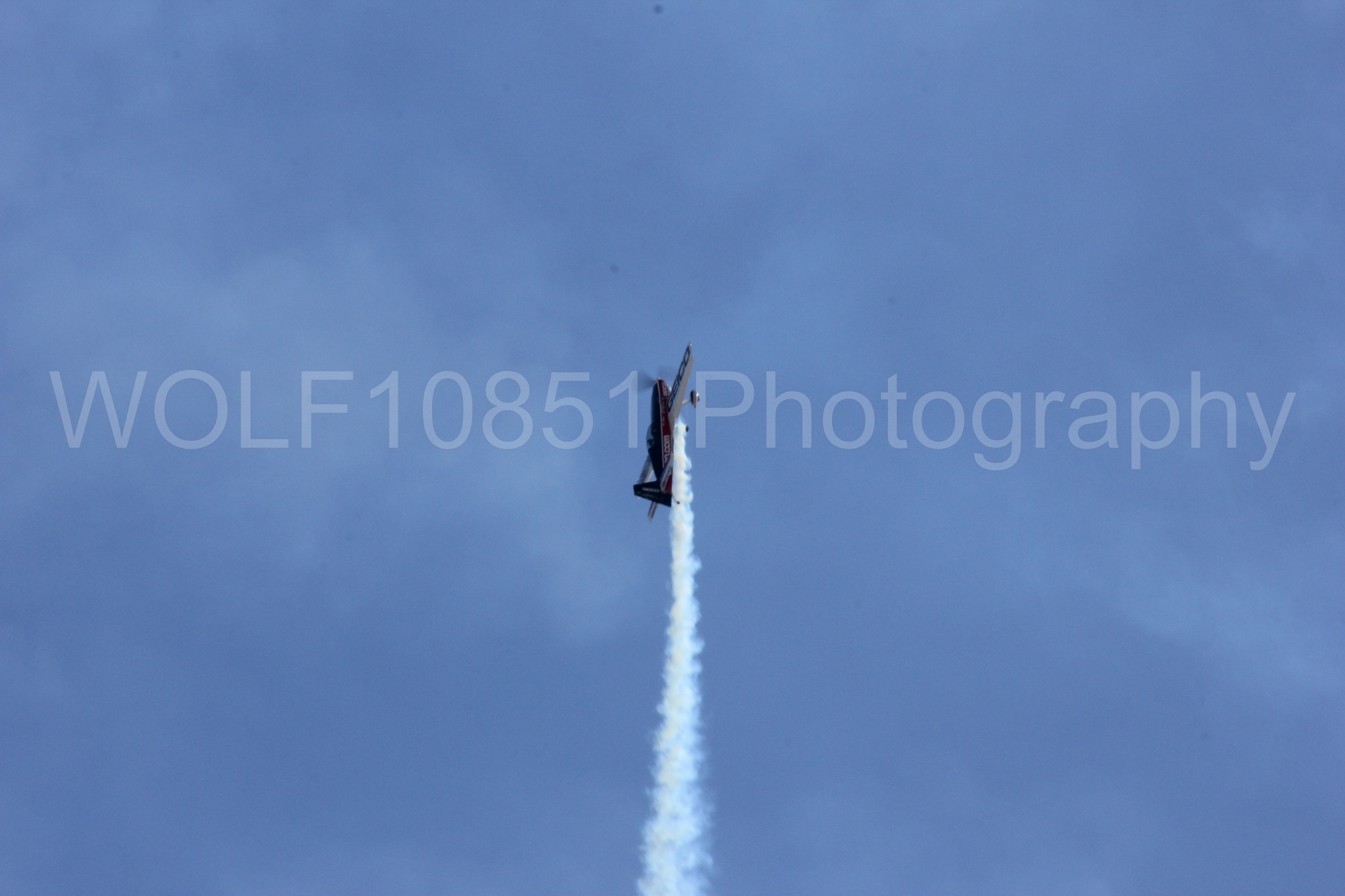 Aviation photography by WOLF10851 featuring Tim Weber, Geico, GEICO Skytypers, Extra EA-300, California Capital Airshow 2012.