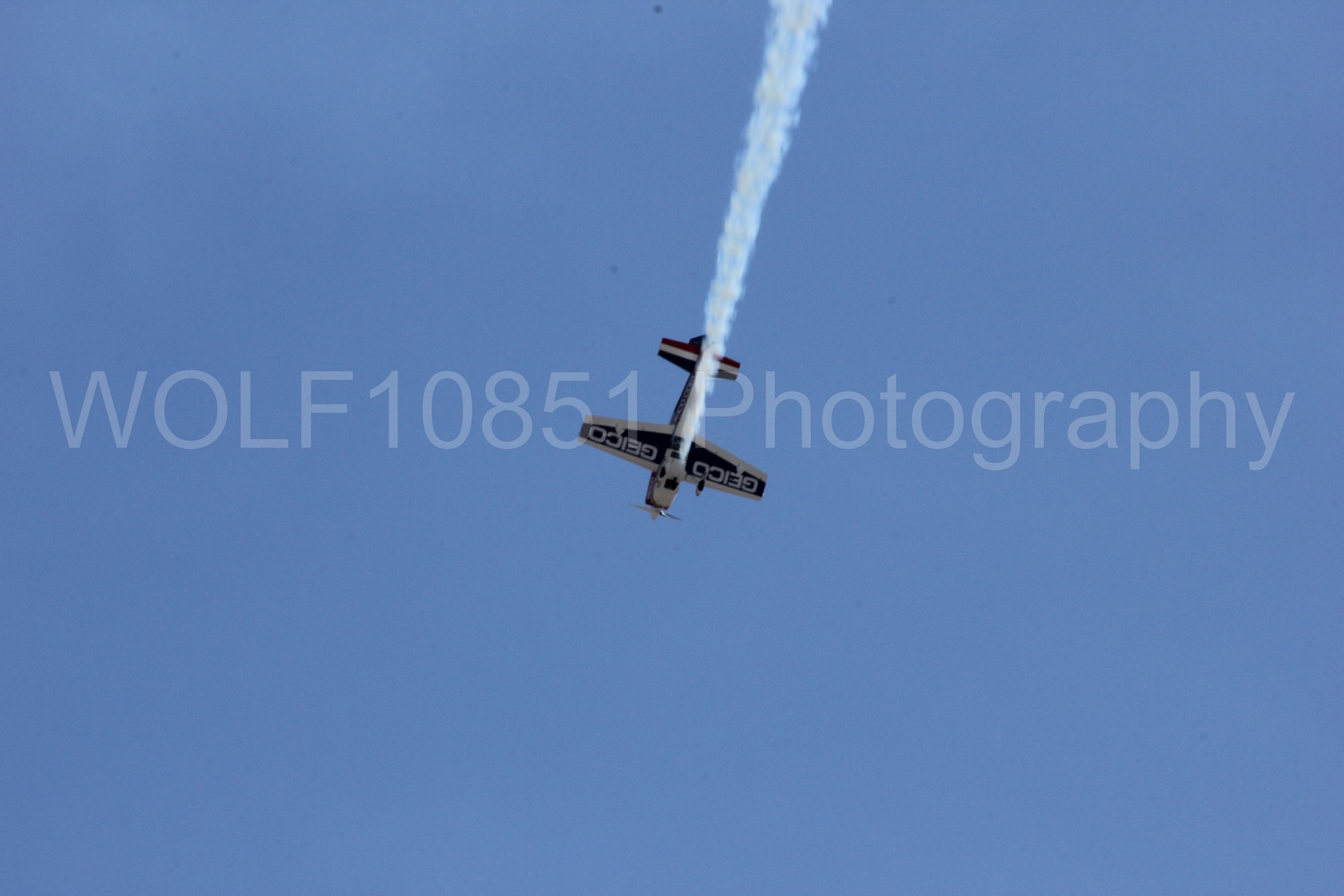 Aviation photography by WOLF10851 featuring Tim Weber, Geico, GEICO Skytypers, Extra EA-300, California Capital Airshow 2012.