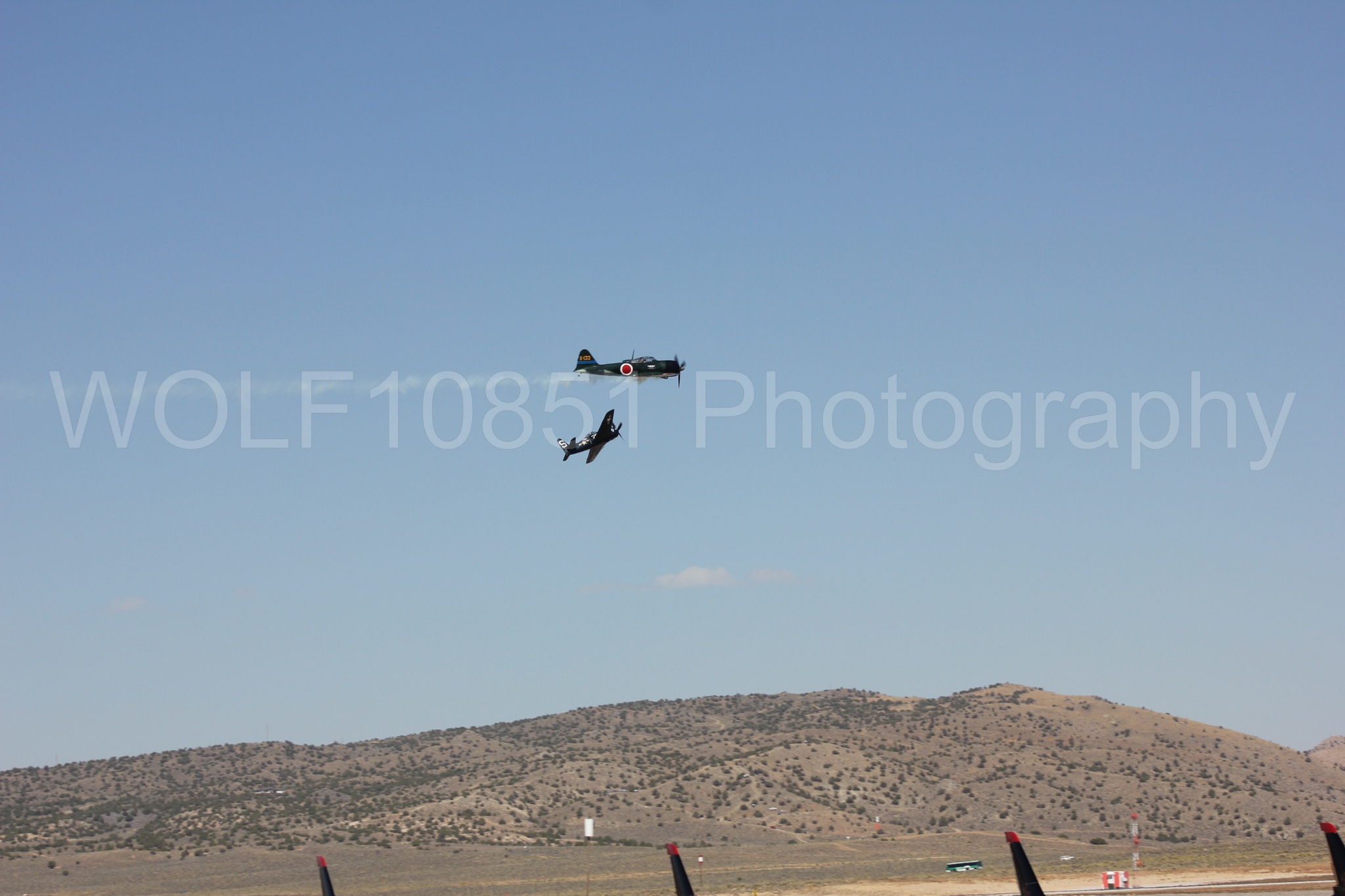 Aviation photography by WOLF10851 featuring f-8f Bearcat, A-6m Zero, Reno Air Races 2013.