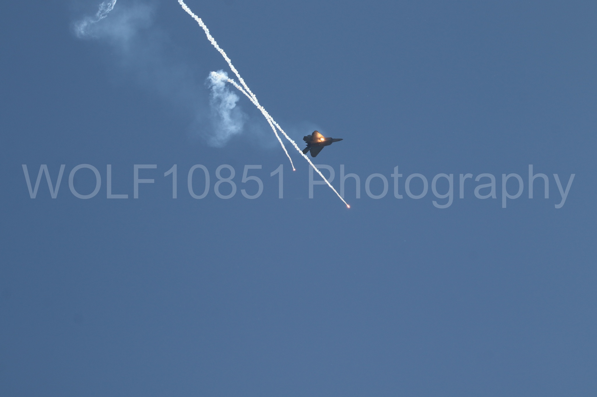 Aviation photography by WOLF10851 featuring F-22 Raptor, Raptor Demo Team, Wings Over Solano 2024, Flares.
