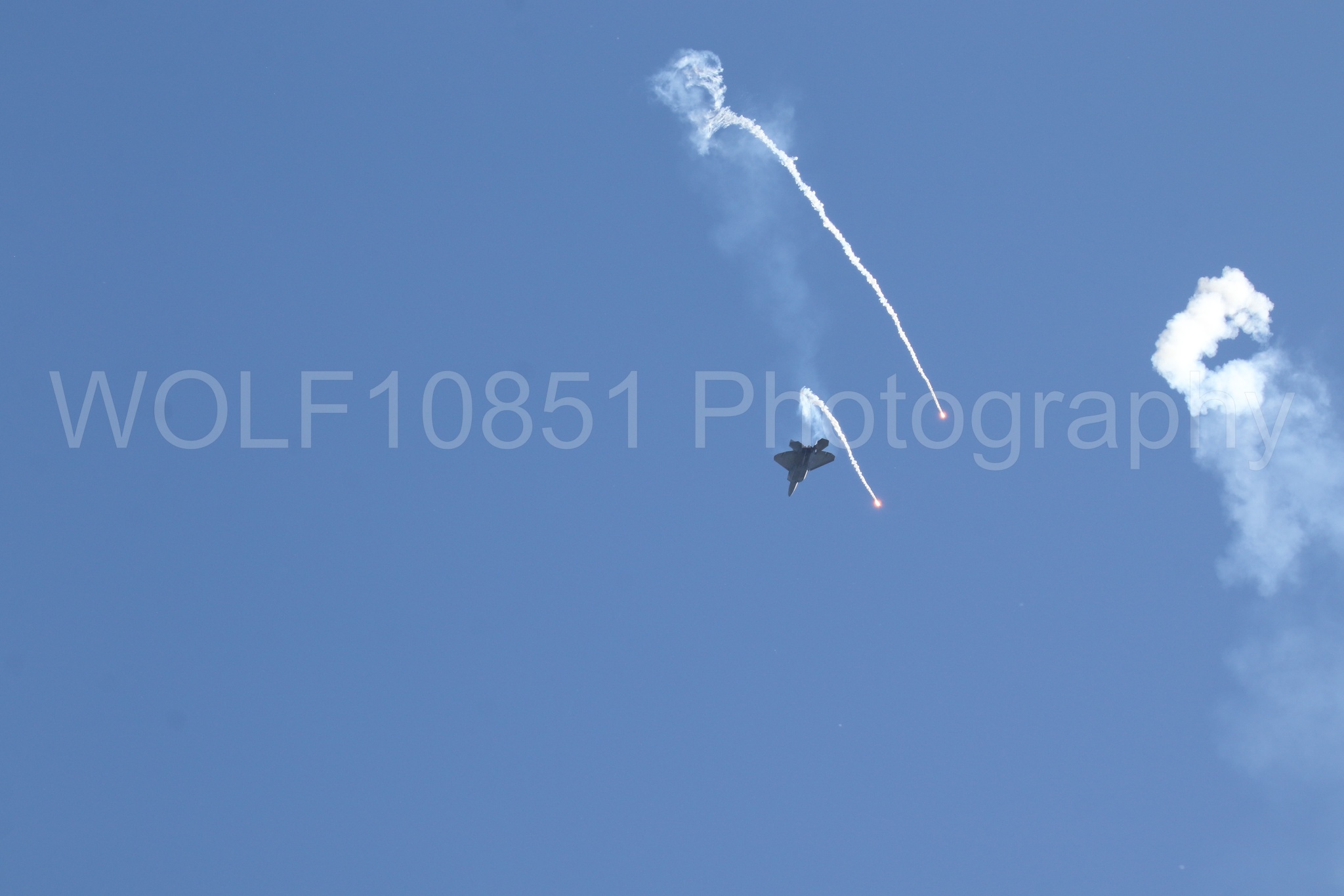 Aviation photography by WOLF10851 featuring F-22 Raptor, Raptor Demo Team, Wings Over Solano 2024, Flares.
