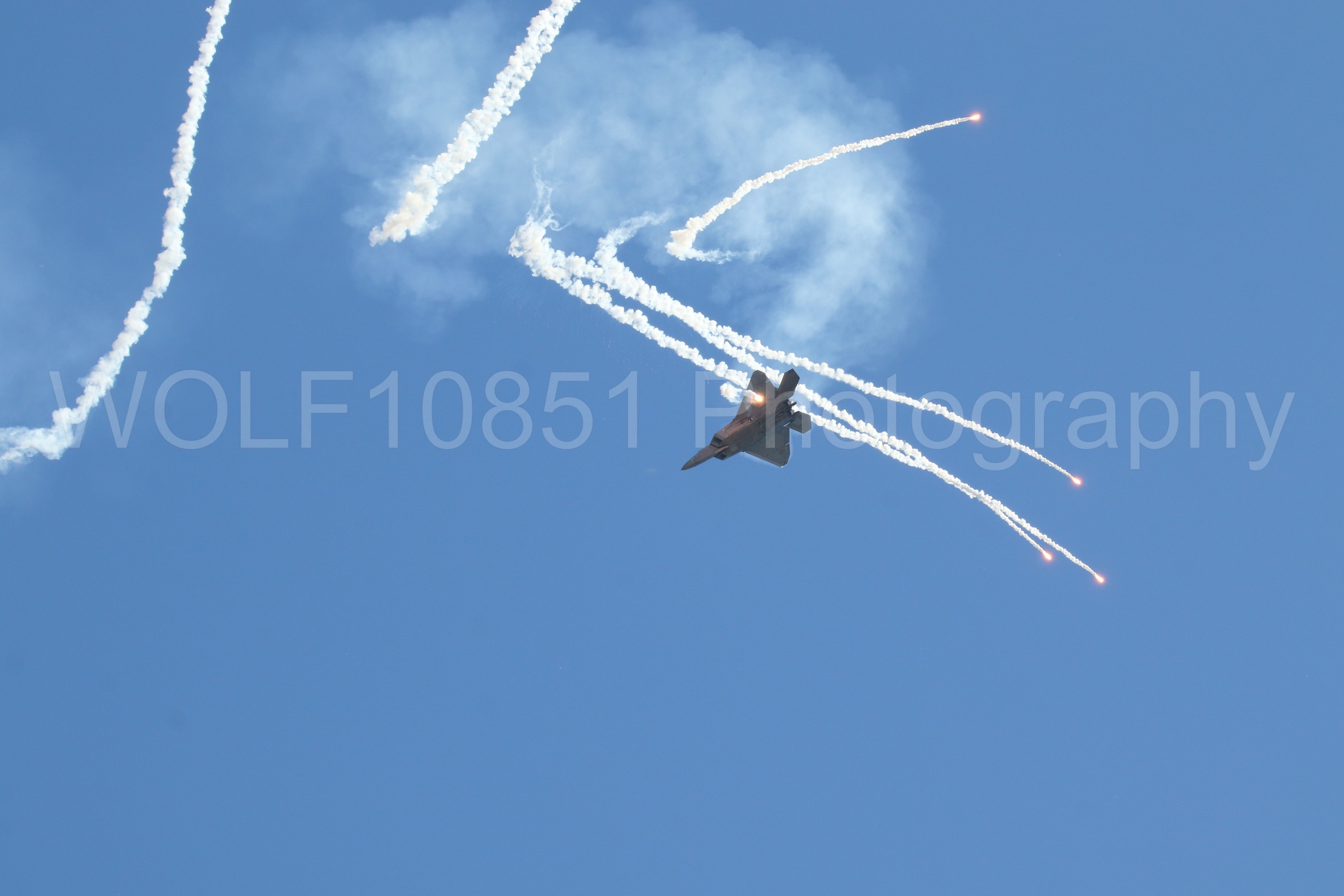 Aviation photography by WOLF10851 featuring F-22 Raptor, Raptor Demo Team, Wings Over Solano 2024, Flares.