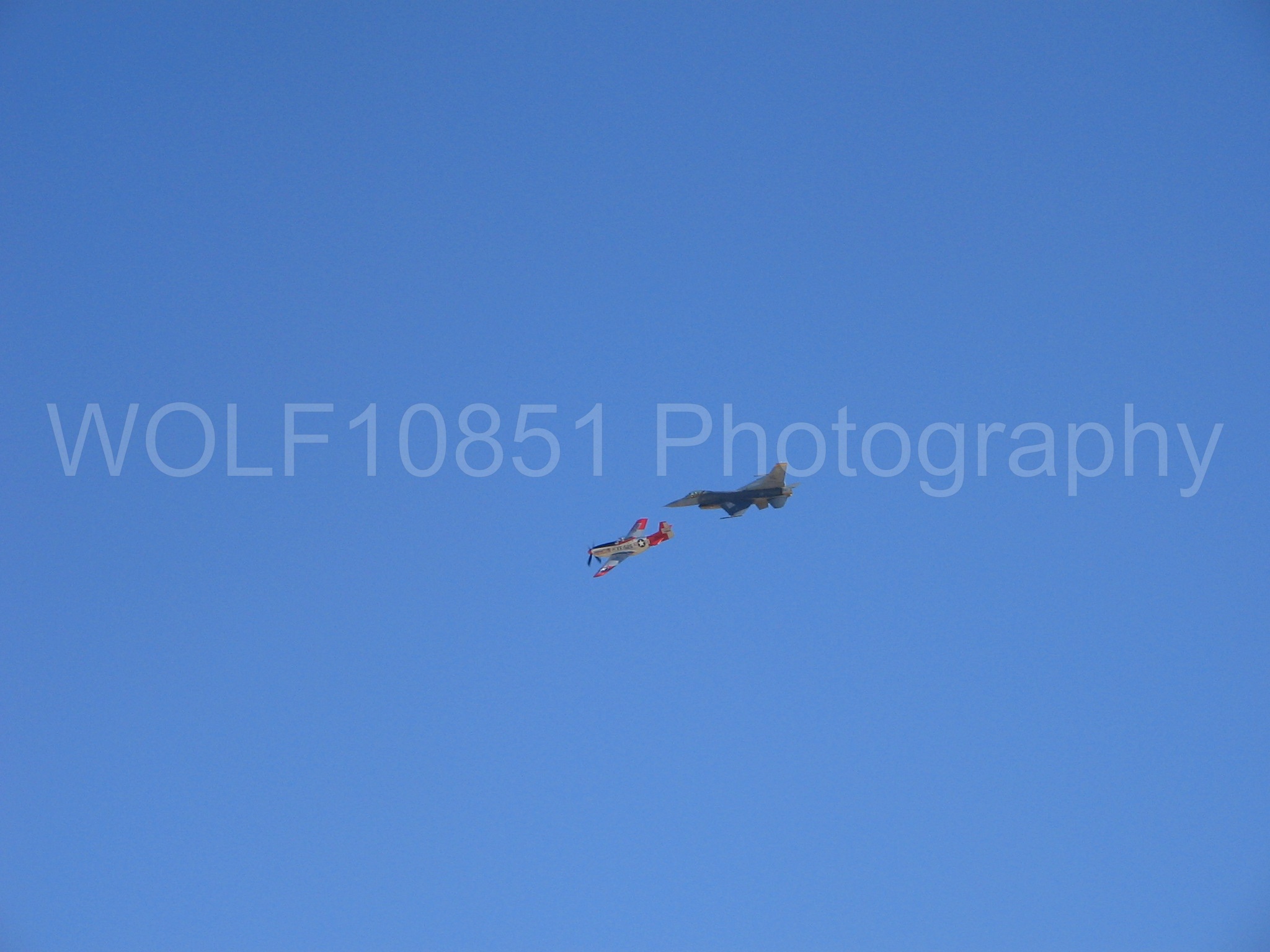 Aviation photography by WOLF10851 featuring Heritage Flight, F-16 Fighting Falcon, P-51 Mustang, Edwards AFB 2005.